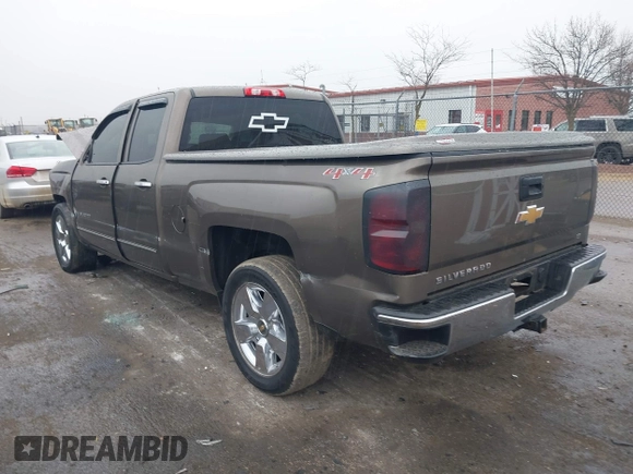 2015 Chevrolet Silverado 1500 LT with VIN 1GCVKREC9FZ237338, listed as a IAAI auction lot 41897225 with 154,229 mi miles and . Bid and sale history available at DreamBid. Image 3.
