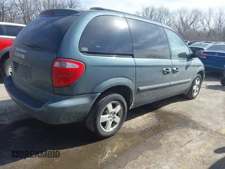 2007 Dodge Caravan SXT with VIN 1D4GP45R57B237884, listed as a IAAI auction lot 41660880 with 120,513 mi miles and . Bid and sale history available at DreamBid. Image 4.