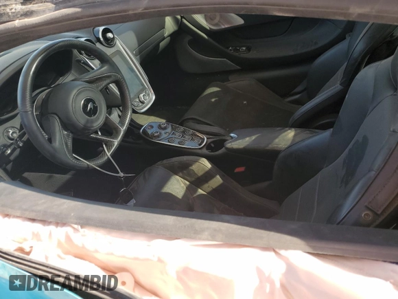 2023 McLaren GT z VIN SBM22GCA0PW002765, wystawiony jako Copart lot #78866364 z przebiegiem Nie podano mil oraz Szkody całkowita. Historia ofert i sprzedaży dostępna na DreamBid. Obrazek 7.