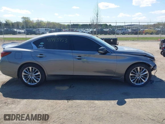 2021 Infiniti Q50 Luxe z VIN JN1EV7BR7MM750265, wystawiony jako IAAI lot #41943953 z przebiegiem 53 750 mil mil oraz . Historia ofert i sprzedaży dostępna na DreamBid. Obrazek 14.