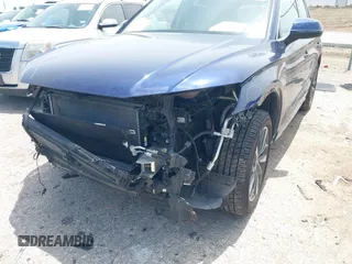 2021 Audi Q5 Premium with VIN WA1AAAFY7M2004975, listed as a IAAI auction lot 42190283 with 56,810 mi miles and . Bid and sale history available at DreamBid. Image 6.