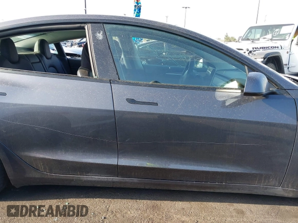 2023 Tesla Model 3 with VIN 5YJ3E1EA4PF427022, listed as a IAAI auction lot 42465964 with 169,346 mi miles and . Bid and sale history available at DreamBid. Image 13.