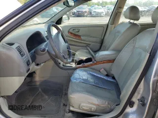 2002 Infiniti I35 Luxury z VIN JNKDA31A12T002704, wystawiony jako Copart lot #71402904 z przebiegiem 196 505 mil mil oraz Nie do naprawy • Non repairable. Historia ofert i sprzedaży dostępna na DreamBid. Obrazek 7.