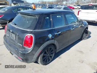2015 MINI Hardtop 4 Door S with VIN WMWXU3C53F2B56459, listed as a IAAI auction lot 41400624 with 233,850 mi miles and . Bid and sale history available at DreamBid. Image 4.