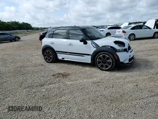 2014 MINI Countryman S with VIN WMWZC3C53EWP52333, listed as a Copart auction lot 54418495 with 34,687 mi miles and Salvage Title. Bid and sale history available at DreamBid. Image 13.