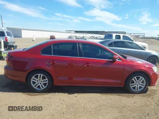 2017 Volkswagen Jetta S z VIN 3VW2B7AJ2HM207207, wystawiony jako IAAI lot #41654971 z przebiegiem 73 427 mil mil oraz . Historia ofert i sprzedaży dostępna na DreamBid. Obrazek 13.