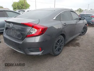 2021 Honda Civic LX z VIN 2HGFC2F64MH555769, wystawiony jako IAAI lot #41954218 z przebiegiem 58 785 mil mil oraz . Historia ofert i sprzedaży dostępna na DreamBid. Obrazek 4.