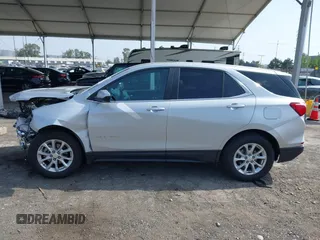 2021 Chevrolet Equinox LT z VIN 2GNAXKEV8M6103073, wystawiony jako IAAI lot #42111470 z przebiegiem 107 700 mil mil oraz . Historia ofert i sprzedaży dostępna na DreamBid. Obrazek 15.