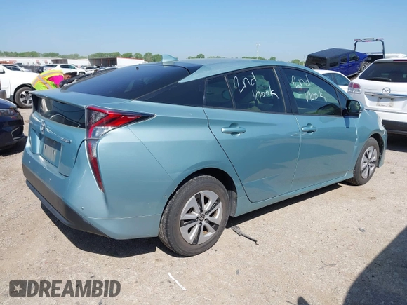 2018 Toyota Prius Two with VIN JTDKBRFU3J3068729, listed as a IAAI auction lot 41989450 with 192,848 mi miles and . Bid and sale history available at DreamBid. Image 4.