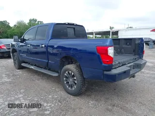 2019 Nissan Titan XD SV with VIN 1N6BA1F46KN514637, listed as a IAAI auction lot 41986617 with 123,872 mi miles. Bid and sale history available at carsss.com. Image 3.