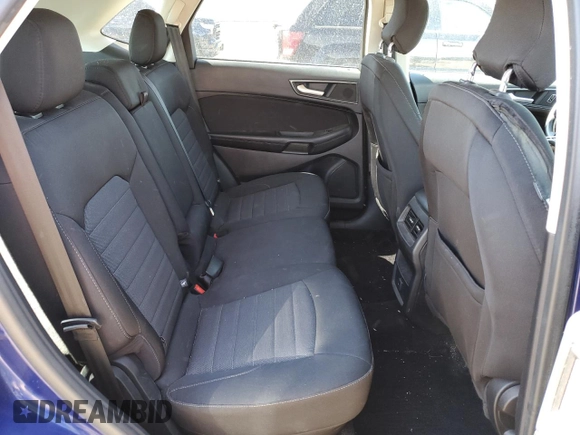 2015 Ford Edge SE z VIN 2FMTK3G8XFBB81101, wystawiony jako Copart lot #50248595 z przebiegiem 106 793 mil mil oraz Szkoda całkowita • Salvage title. Historia ofert i sprzedaży dostępna na DreamBid. Obrazek 11.
