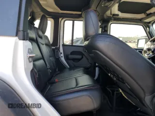 2022 Jeep Wrangler Unlimited Rubicon с VIN 1C4HJXFN3NW193177, выставлен на аукционе Copart как лот 82002224 с пробегом 34 762 миль миль и Списание • Salvage title. История ставок и продаж доступна на DreamBid. Изображение 11.