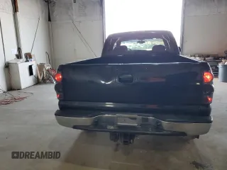 2005 Chevrolet Silverado 1500 Z71 z VIN 1GCEK19B75Z241454, wystawiony jako Copart lot #52154325 z przebiegiem 203 436 mil mil oraz Szkoda całkowita • Salvage title. Historia ofert i sprzedaży dostępna na DreamBid. Obrazek 6.