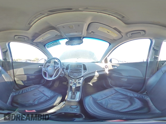 2012 Chevrolet Sonic LTZ z VIN 1G1JE6SH2C4126197, wystawiony jako Copart lot #85541214 z przebiegiem Nie podano mil oraz Szkoda całkowita • Salvage title. Historia ofert i sprzedaży dostępna na DreamBid. Obrazek 13.