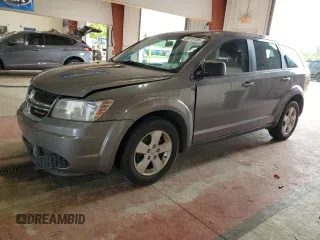 2013 Dodge Journey American Value z VIN 3C4PDCABXDT541764, wystawiony jako Copart lot #59919185 z przebiegiem 152 383 mil mil oraz Szkoda całkowita • Salvage title. Historia ofert i sprzedaży dostępna na DreamBid. Obrazek 1.
