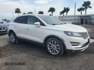 2015 Lincoln MKC z VIN 5LMCJ1A94FUJ19967, wystawiony jako Copart lot #58873665 z przebiegiem Nie podano mil oraz Szkody całkowita. Historia ofert i sprzedaży dostępna na DreamBid. Obrazek 4.