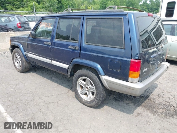 2001 Jeep Cherokee Sport with VIN 1J4FT48S01L604740, listed as a IAAI auction lot 42440685 with 198,284 mi miles and . Bid and sale history available at DreamBid. Image 3.