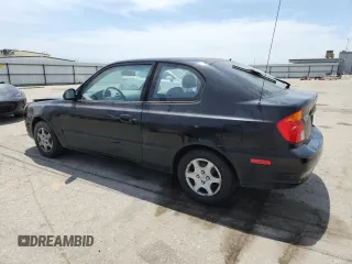 2003 Hyundai Accent GL z VIN KMHCG35C33U258812, wystawiony jako Copart lot #57509245 z przebiegiem 153 716 mil mil oraz Szkoda całkowita • Salvage title. Historia ofert i sprzedaży dostępna na DreamBid. Obrazek 2.
