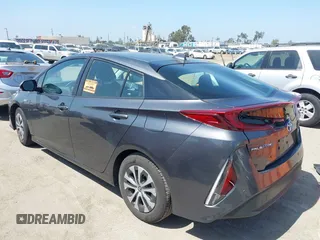 2021 Toyota Prius LE with VIN JTDKAMFP3M3167586, listed as a IAAI auction lot 39672661 with 42,050 mi miles and . Bid and sale history available at DreamBid. Image 3.