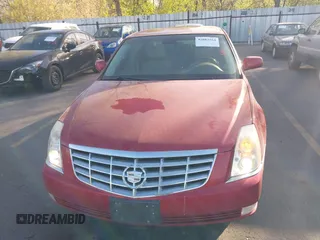 2006 Cadillac DTS 1SC z VIN 1G6KD57Y36U203703, wystawiony jako IAAI lot #42083564 z przebiegiem 183 549 mil mil oraz . Historia ofert i sprzedaży dostępna na DreamBid. Obrazek 6.