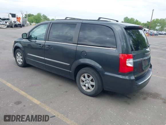 2012 Chrysler Town & Country Touring with VIN 2C4RC1BG1CR312532, listed as a IAAI auction lot 42194864 with 197,609 mi miles and . Bid and sale history available at DreamBid. Image 3.