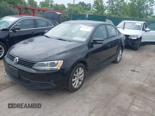 2011 Volkswagen Jetta SE with VIN 3VWDX7AJ7BM052493, listed as a IAAI auction lot 42745045 with 179,732 mi miles and . Bid and sale history available at DreamBid. Image 2.