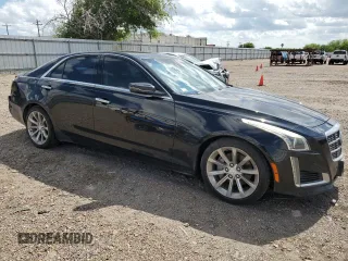 2014 Cadillac CTS Performance RWD with VIN 1G6AS5S33E0130965, listed as a Copart auction lot 60669564 with 28,435 mi miles and Salvage Title. Bid and sale history available at DreamBid. Image 4.