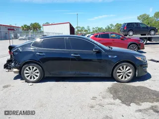 2017 Kia Optima EX with VIN 5XXGU4L35HG142807, listed as a IAAI auction lot 41856251 with 104,634 mi miles. Bid and sale history available at carsss.com. Image 13.