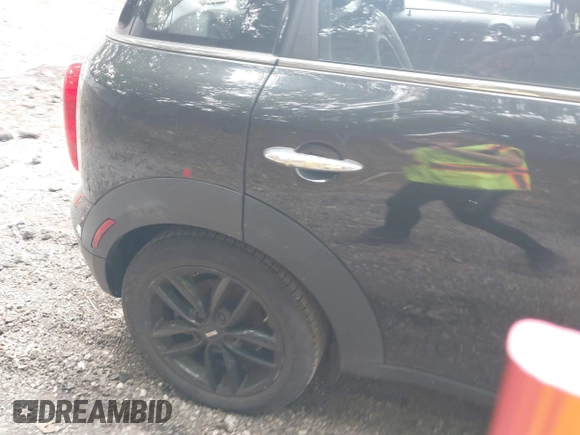 2012 MINI Countryman with VIN WMWZB3C5XCWM30191, listed as a IAAI auction lot 42435291 with 103,254 mi miles and . Bid and sale history available at DreamBid. Image 15.