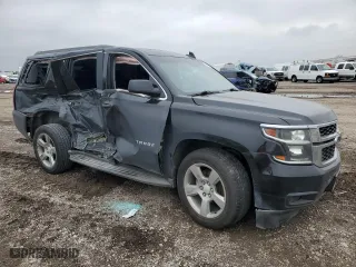 2019 Chevrolet Tahoe LT with VIN 1GNSCBKC6KR254630, listed as a Copart auction lot 50657345 with 111,297 mi miles and Salvage Title. Bid and sale history available at carsss.com. Image 4.
