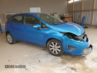 2013 Ford Fiesta SE z VIN 3FADP4EJ7DM216071, wystawiony jako Copart lot #58629155 z przebiegiem 73 407 mil mil oraz Szkoda całkowita • Salvage title. Historia ofert i sprzedaży dostępna na DreamBid. Obrazek 4.