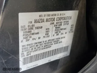 2001 Mazda Tribute LX with VIN 4F2YU09151KM38909, listed as a Copart auction lot 77808264 with 136,005 mi miles and Salvage Title. Bid and sale history available at carsss.com. Image 13.