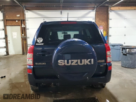 2012 Suzuki Grand Vitara Limited z VIN JS3TD0D77C4101382, wystawiony jako Copart lot #60017895 z przebiegiem 118 024 mil mil oraz Szkoda całkowita • Salvage title. Historia ofert i sprzedaży dostępna na DreamBid. Obrazek 6.