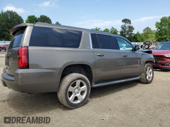 2016 Chevrolet Suburban LT z VIN 1GNSKHKC6GR360685, wystawiony jako Copart lot #56652175 z przebiegiem 115 212 mil mil oraz Szkoda całkowita • Salvage title. Historia ofert i sprzedaży dostępna na DreamBid. Obrazek 3.
