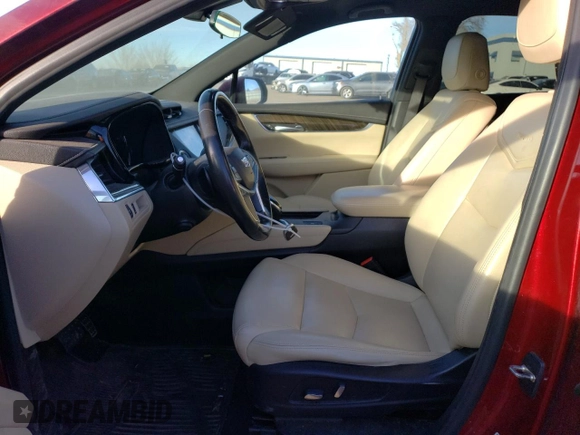2018 Cadillac XT5 FWD with VIN 1GYKNARS2JZ241702, listed as a Copart auction lot 84031294 with 67,866 mi miles and Salvage title. Bid and sale history available at DreamBid. Image 7.