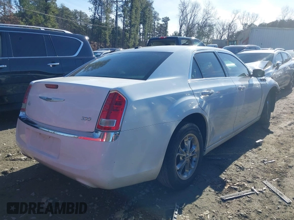 2013 Chrysler 300 with VIN 2C3CCAAG0DH657568, listed as a IAAI auction lot 41319665 with 213,034 mi miles. Bid and sale history available at carsss.com. Image 4.