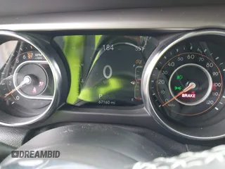 2020 Jeep Gladiator Sport S with VIN 1C6HJTAG8LL141535, listed as a IAAI auction lot 41673860 with 67,160 mi miles. Bid and sale history available at carsss.com. Image 7.