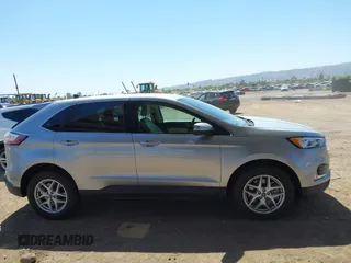 2021 Ford Edge SEL z VIN 2FMPK4J98MBA50772, wystawiony jako IAAI lot #42224052 z przebiegiem 76 061 mil mil oraz . Historia ofert i sprzedaży dostępna na DreamBid. Obrazek 13.