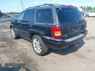 2002 Jeep Grand Cherokee Limited with VIN 1J4GW58N02C176004, listed as a IAAI auction lot 42687339 with 171,545 mi miles and . Bid and sale history available at DreamBid. Image 3.