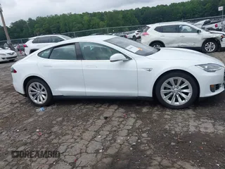 2016 Tesla Model S 70 with VIN 5YJSA1E11GF132984, listed as a IAAI auction lot 42428634 with Not provided miles and . Bid and sale history available at DreamBid. Image 12.