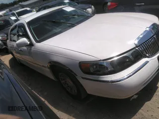 1998 Lincoln Town Car Signature with VIN 1LNFM82W4WY672955, listed as a IAAI auction lot 42211994 with 162,058 mi miles and . Bid and sale history available at DreamBid. Image 1.