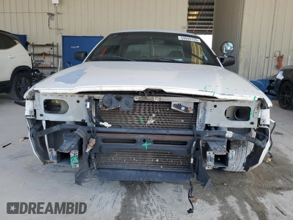 2005 Ford Police Interceptor с VIN 2FAFP71W15X134743, выставлен на аукционе Copart как лот 59949735 с пробегом 131 984 миль миль и Списание • Salvage title. История ставок и продаж доступна на DreamBid. Изображение 5.