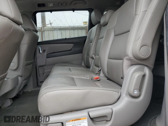 2014 Honda Odyssey EX-L with VIN 5FNRL5H68EB103941, listed as a Copart auction lot 60715095 with 109,013 mi miles and Salvage title. Bid and sale history available at DreamBid. Image 11.