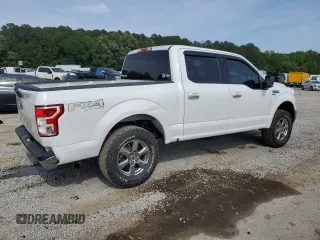 2018 Ford F-150 XL with VIN 1FTEW1E59JFA28036, listed as a Copart auction lot 57181525 with 121,384 mi miles and Salvage title. Bid and sale history available at DreamBid. Image 3.