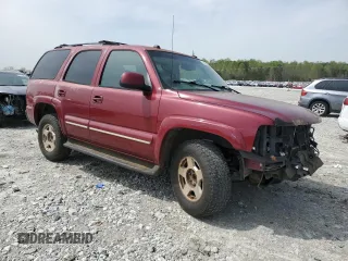 2004 Chevrolet Tahoe LT with VIN 1GNEC13Z04J182593, listed as a Copart auction lot 51489455 with 305,310 mi miles and Salvage title. Bid and sale history available at DreamBid. Image 4.