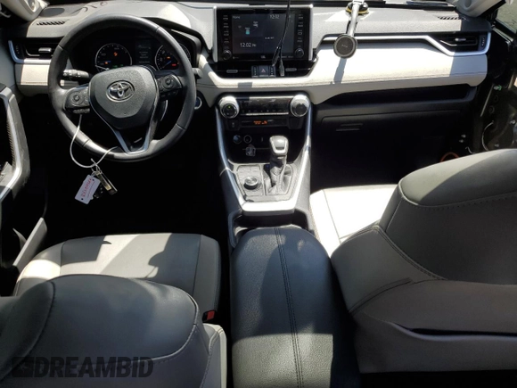 2021 Toyota RAV4 Hybrid LE with VIN 2T3B6RFVXMW028517, listed as a Copart auction lot 61558755 with 136,330 mi miles and Salvage title. Bid and sale history available at DreamBid. Image 8.