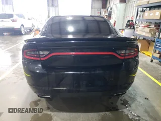 2015 Dodge Charger SE z VIN 2C3CDXBG6FH848445, wystawiony jako Copart lot #54825915 z przebiegiem 121 764 mil mil oraz Szkoda całkowita • Salvage title. Historia ofert i sprzedaży dostępna na DreamBid. Obrazek 6.