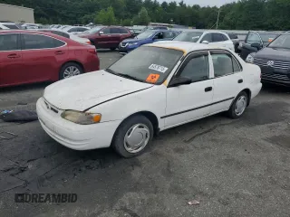 2000 Toyota Corolla VE with VIN 2T1BR12E2YC369893, listed as a Copart auction lot 64576715 with Not provided miles and Non repairable. Bid and sale history available at DreamBid. Image 1.