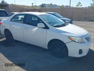 2013 Toyota Corolla L with VIN 5YFBU4EE2DP125215, listed as a IAAI auction lot 42158224 with 196,550 mi miles. Bid and sale history available at carsss.com. Image 6.