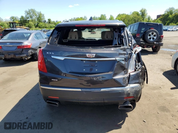 2018 Cadillac XT5 AWD with VIN 1GYKNBRS8JZ203963, listed as a Copart auction lot 57243165 with 18,407 mi miles and Salvage title. Bid and sale history available at DreamBid. Image 6.